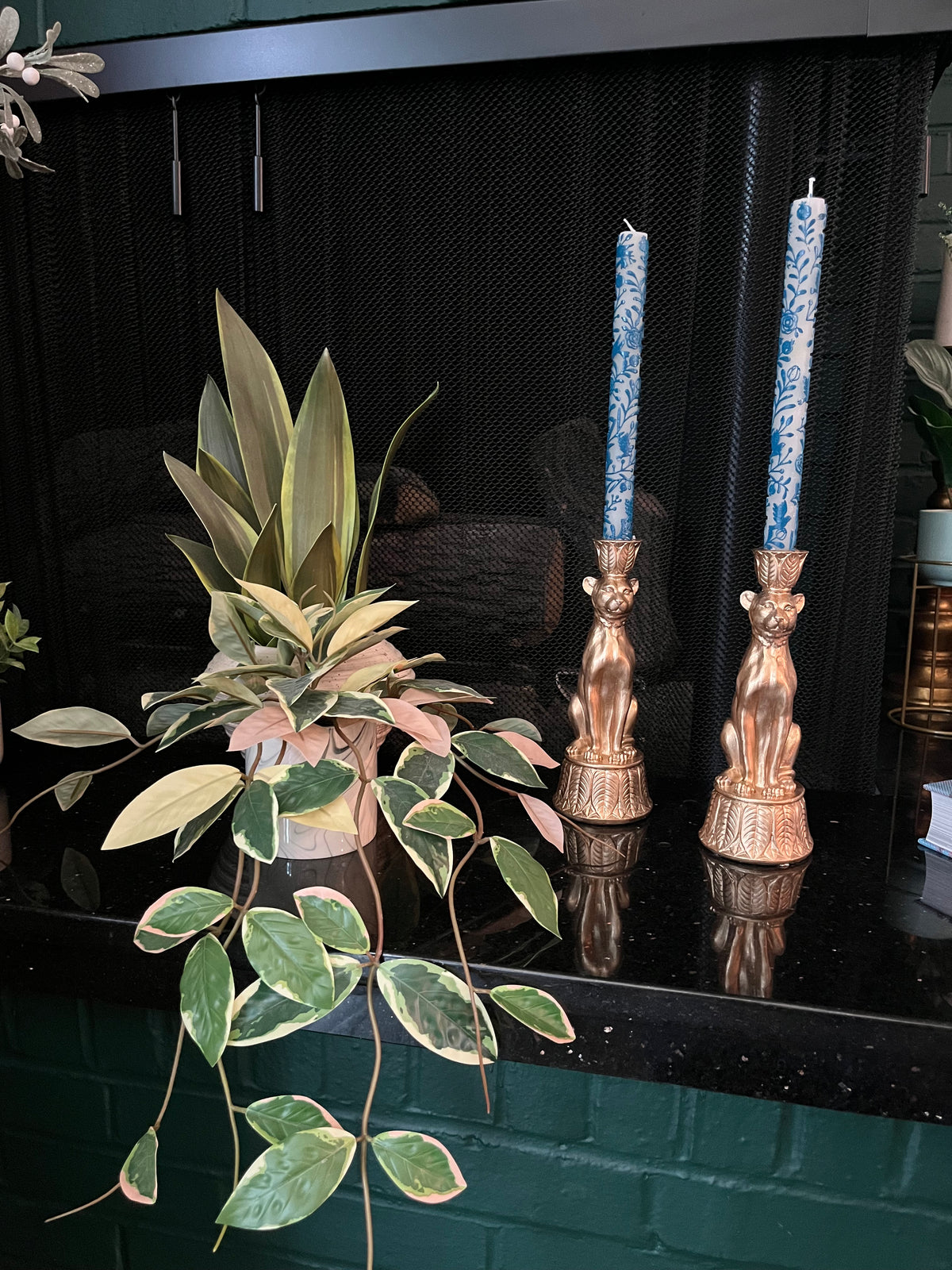 Pair of gold leopard candleholders