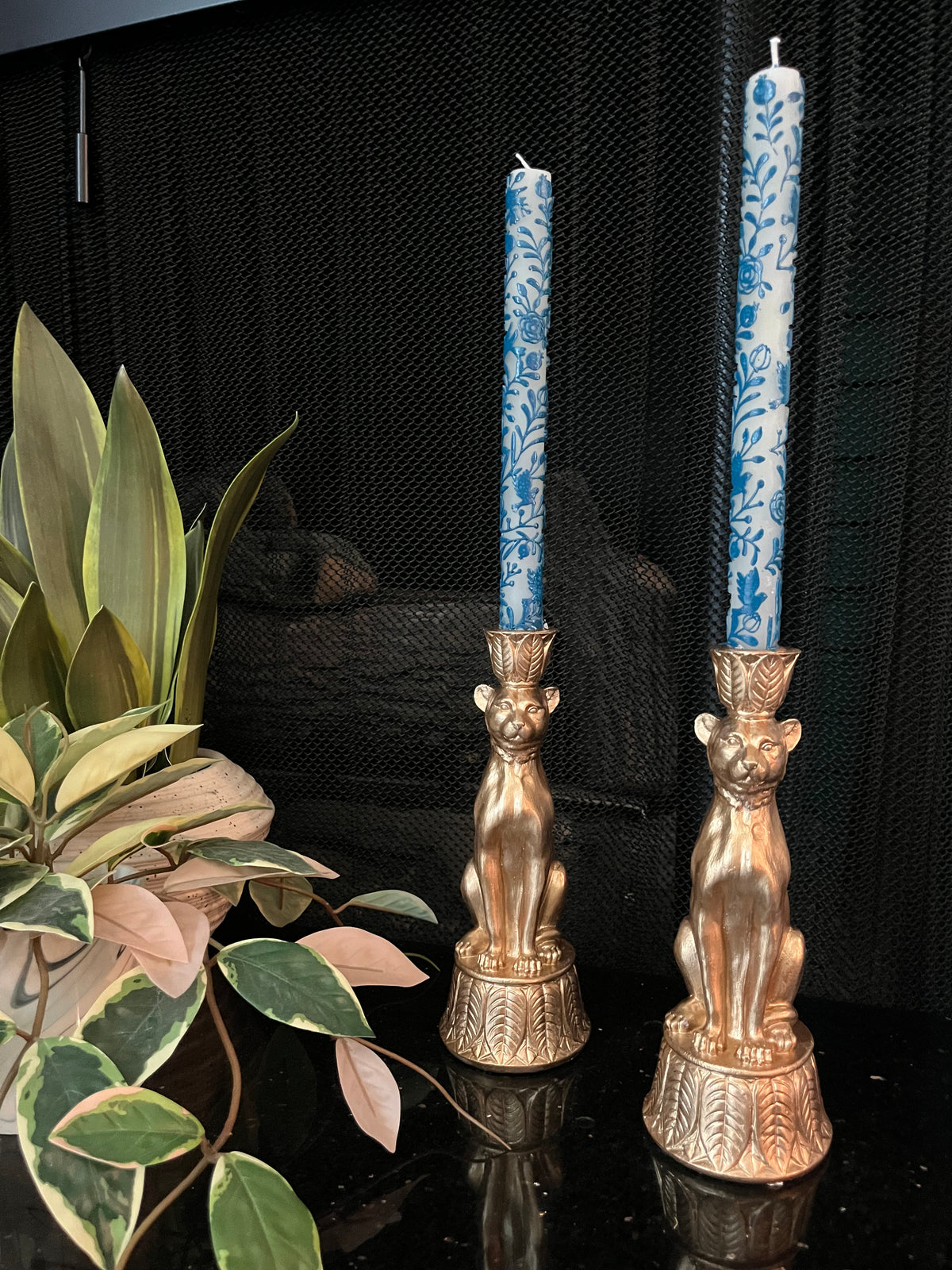 Pair of gold leopard candleholders