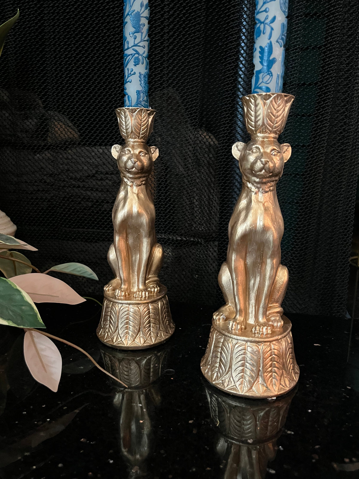 Pair of gold leopard candleholders