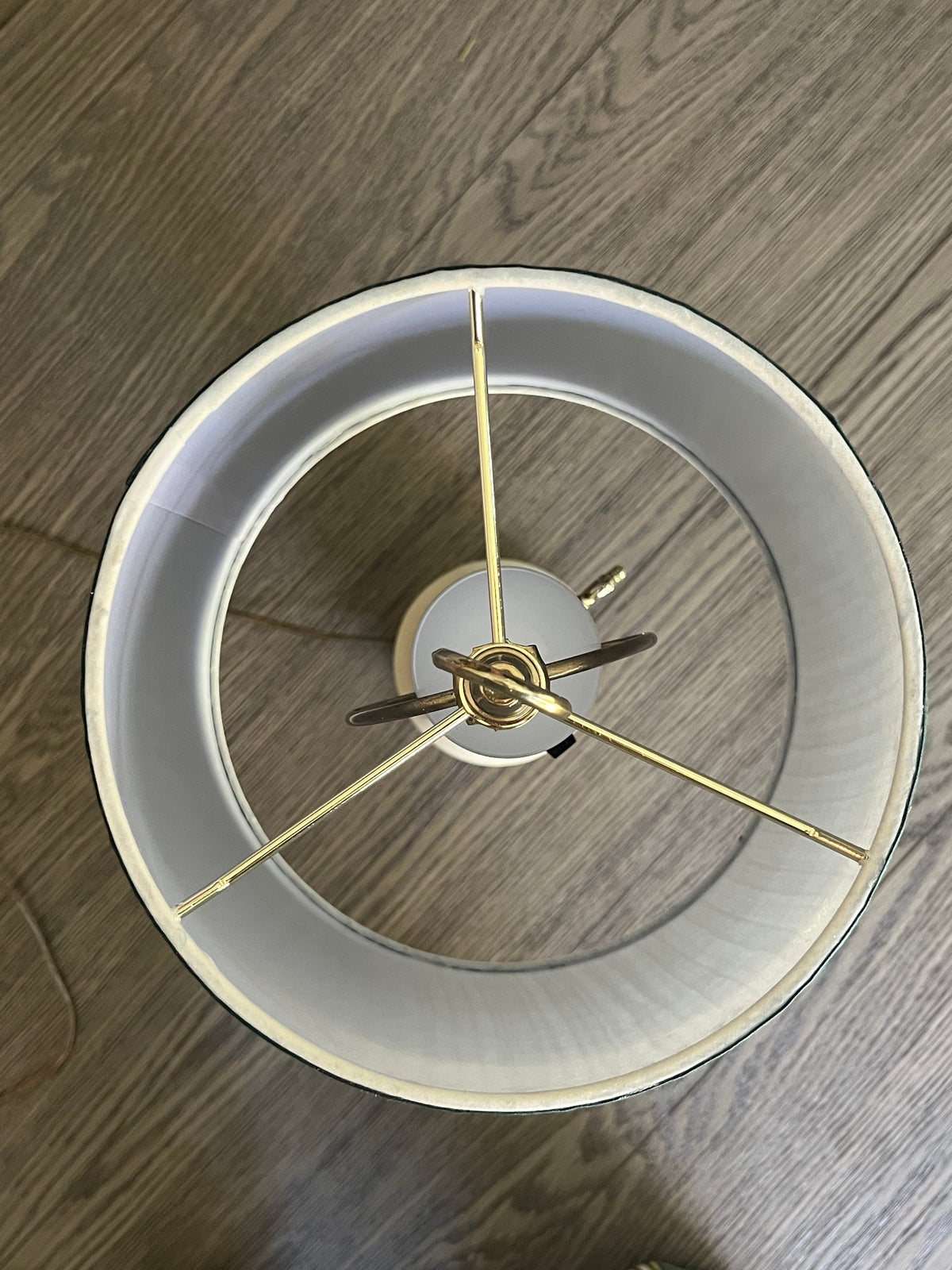 Vintage table lamp with a green pleated shade