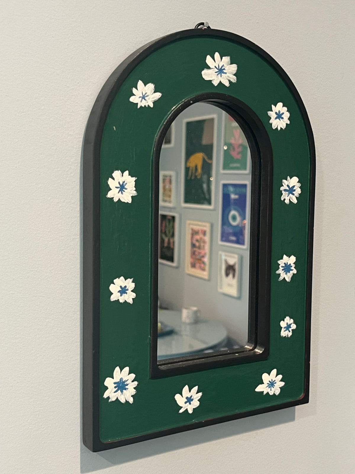 Green arch mirror hand painted with white flowers
